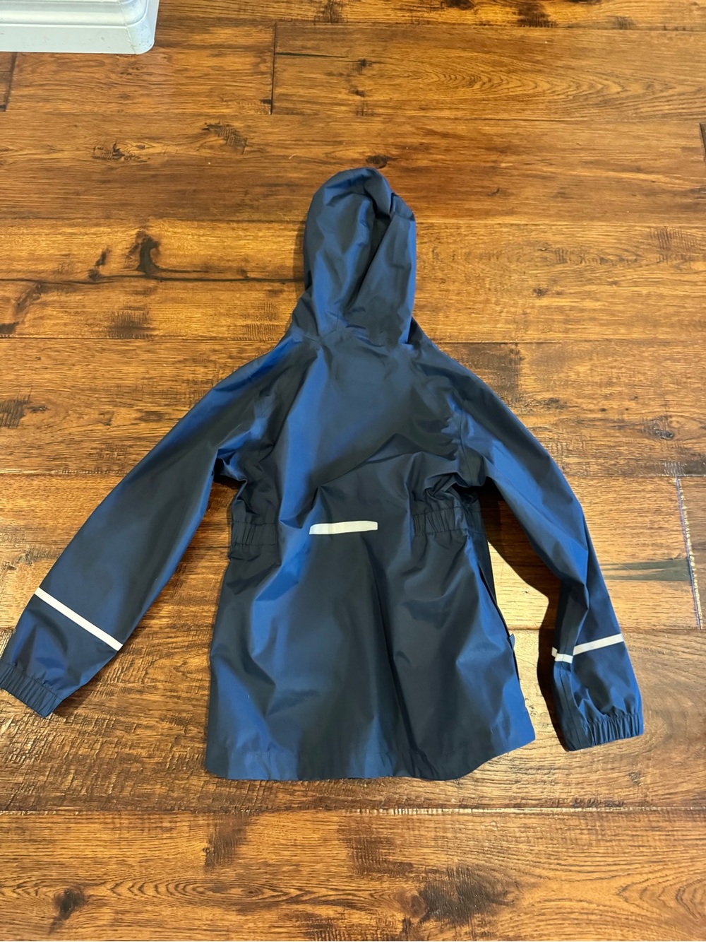 Patagonia Kids Navy Blue Hooded Rain Jacket with Reflective Trim - Picture 4 of 4